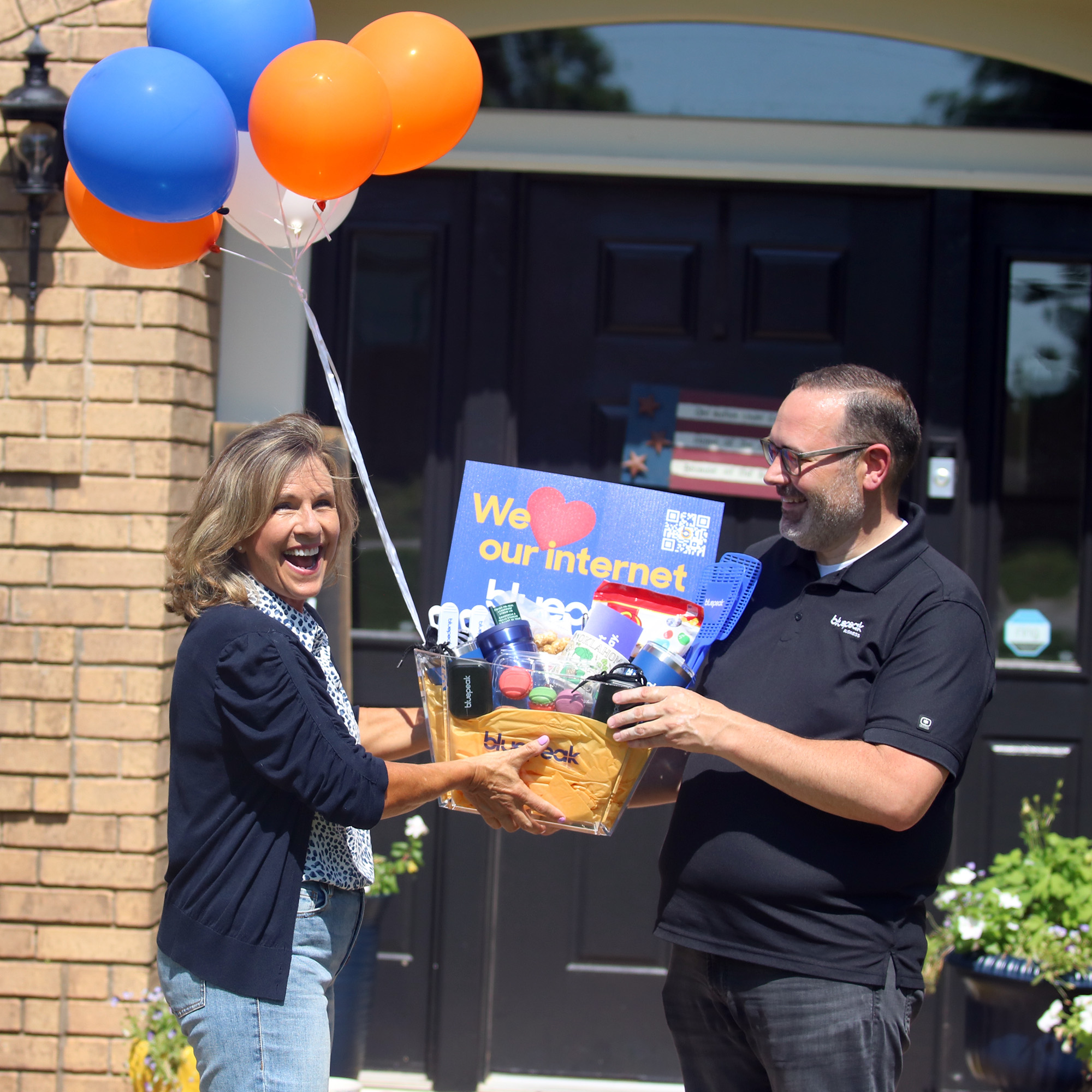 Stillwater’s Lydia Taylor, pictured with Community Marketing Manager Jeremy Davidson, became Bluepeak’s 10,000th subscriber in Oklahoma on Wednesday, June 28, 2023.