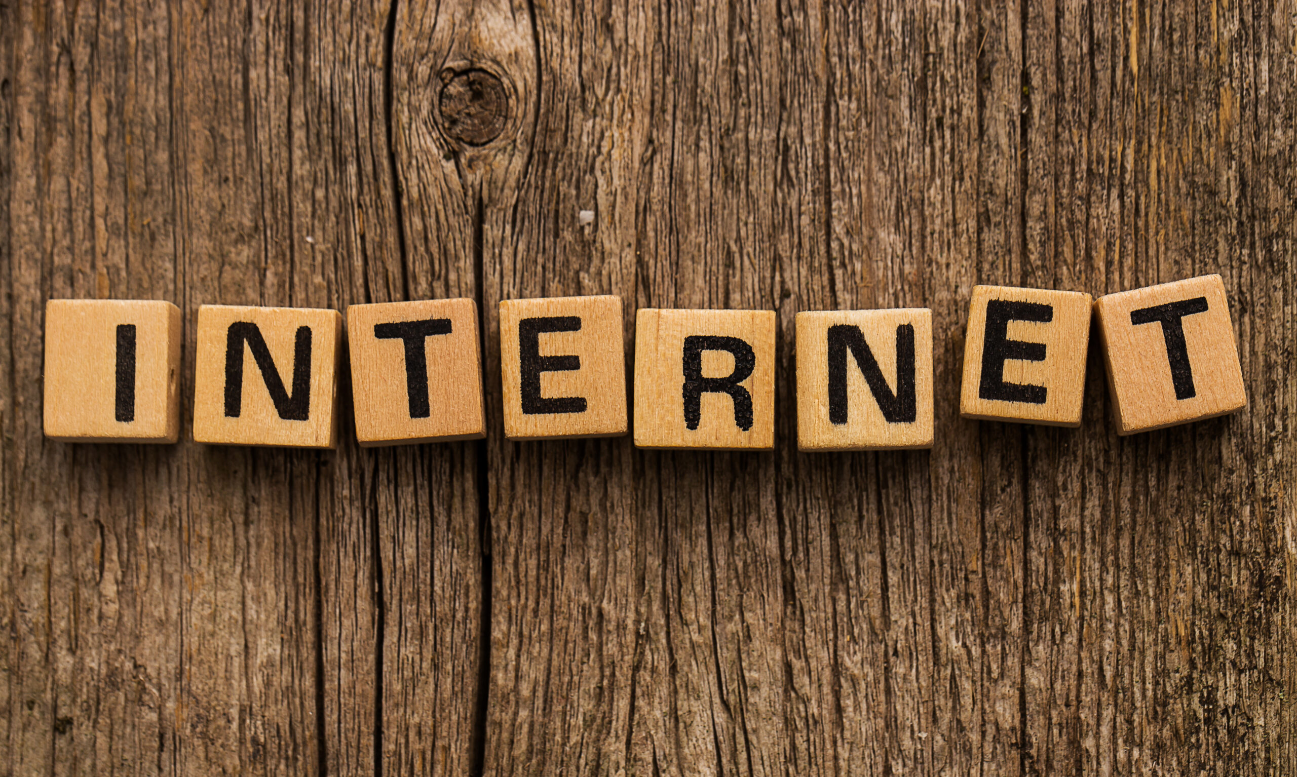 Wooden letter cubes that spell “INTERNET”